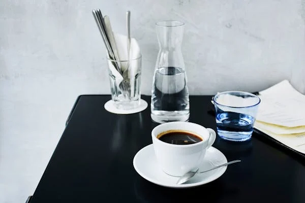 cup of water and black tea